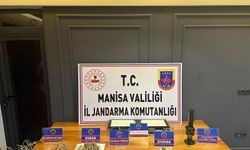 Manisa'da bir kişi evinde iklimlendirme sistemiyle kenevir yetiştirmiş