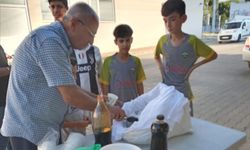 Sarıgöl'de pekmezli 'Karbastı' ikramı serinlik getirdi